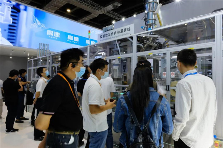 胶囊饮品全自动灌装线.jpg 胶囊饮品全自动灌装线.jpg